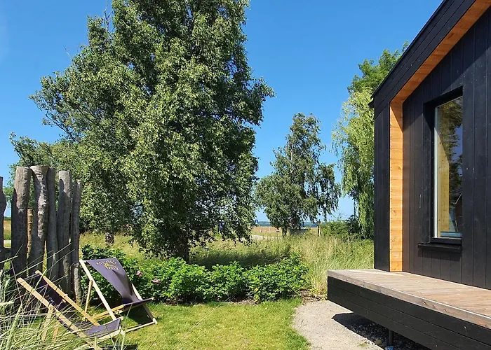Werder -- Grosses Sonnendeck -- 150m I Sauna I Ekamin I Bis 8 Pers I Meerblick I By 